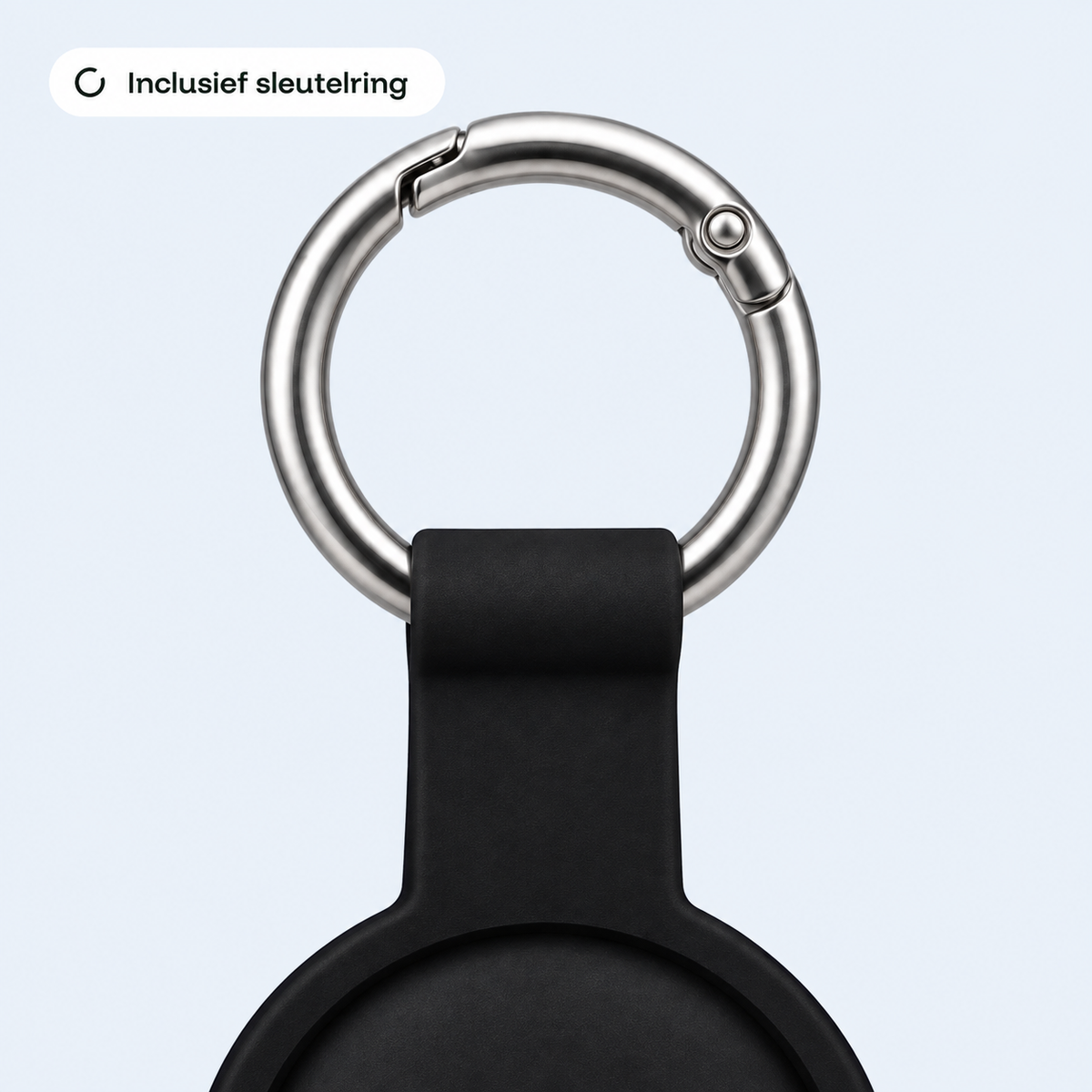 Close-up van de zilveren sleutelring met veersluiting die bij de sleutelhanger zit